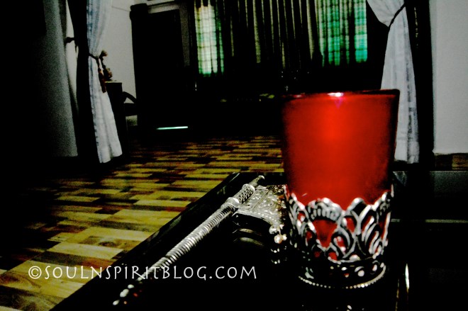 scarlet silver studded glass setting the mood of the evening