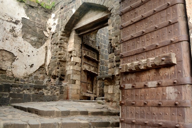 The lofty gates and narrow entrance 