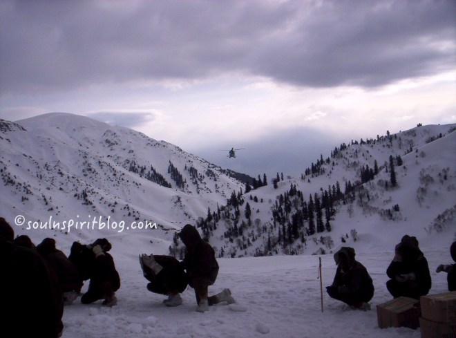 Soldiers waiting for rations and rescue